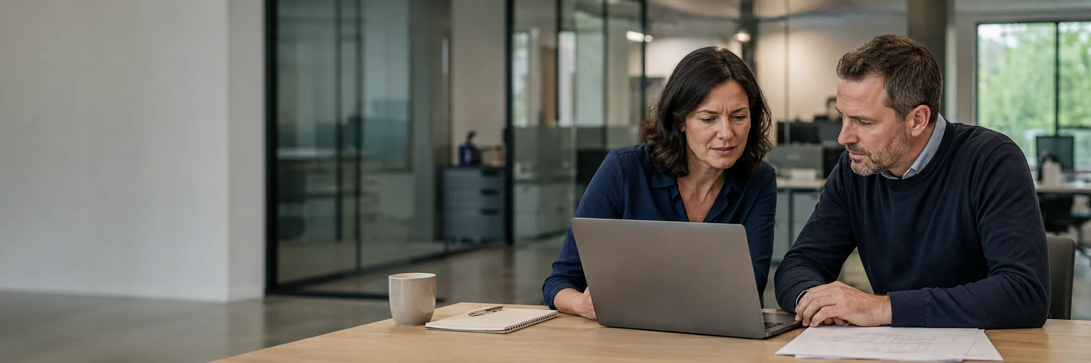 Business owner studying a scored view of the competitive field
